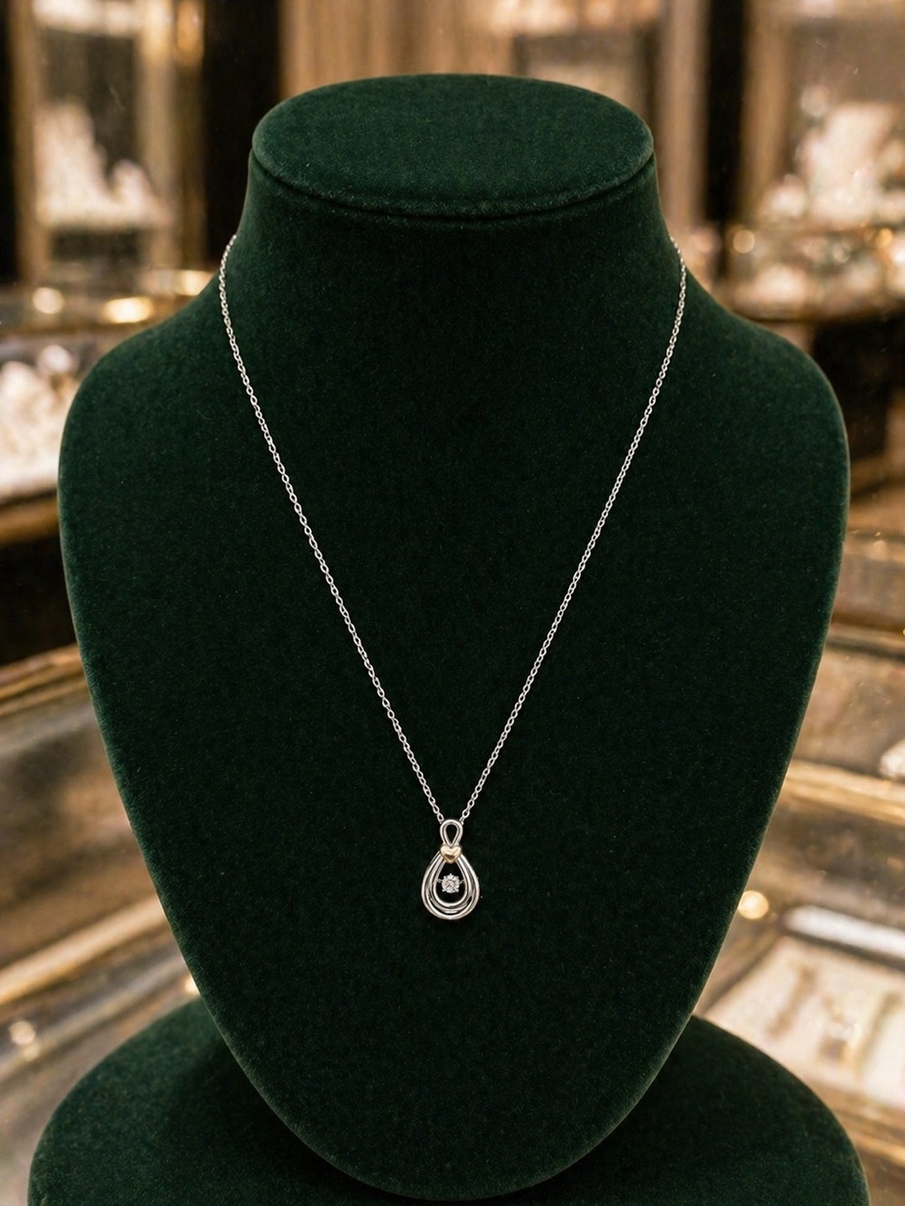 Sterling Silver 925 and 10kt  gold tear drop pendant with floating